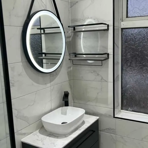 Carrara White Gloss Marble Effect Vitrified Ceramic Tile 60x30cm